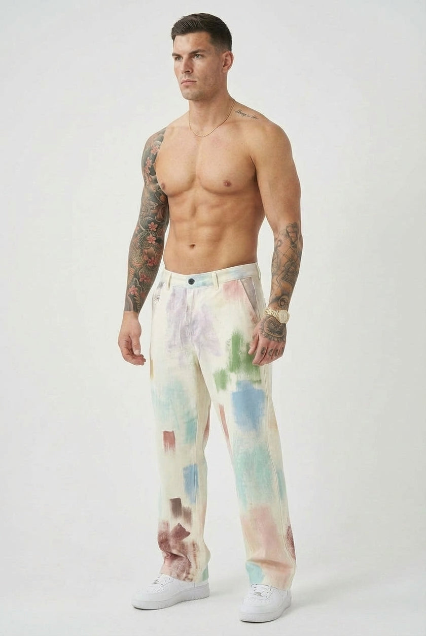 Men's black painted trousers by FJØRNA, showing the stylish design and fit of these modern pants in a close-up image.