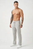 Men's light grey merino wool trousers by FJØRNA, stylish and comfortable pants for casual or office wear.