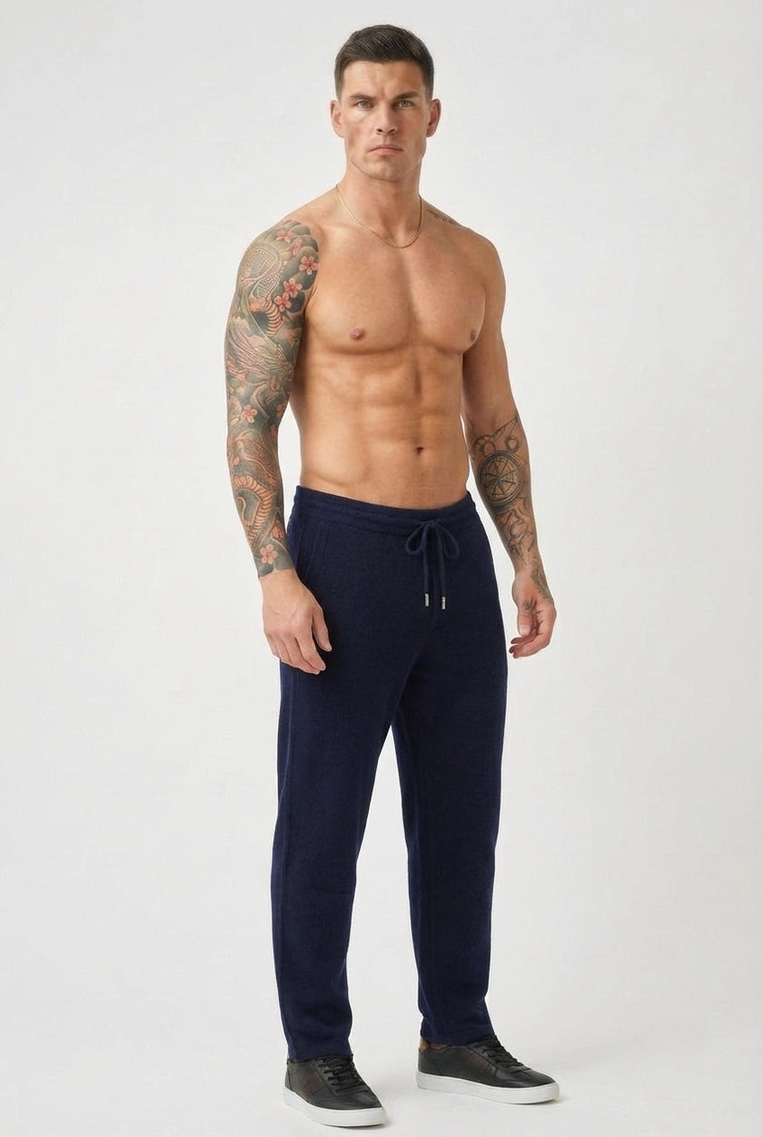 Men's navy Merino wool trousers from FJØRNA, casual fit, featuring a comfortable waistband and tailored design.