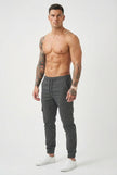 Men's grey cargo jogger trousers by FJØRNA, featuring a relaxed fit with multiple pockets and comfortable fabric for casual wear.