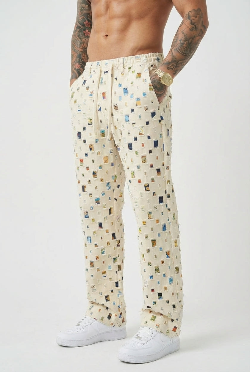 Men's straight-fit white trousers by FJØRNA, styled casually with front pockets and a tailored waistband.