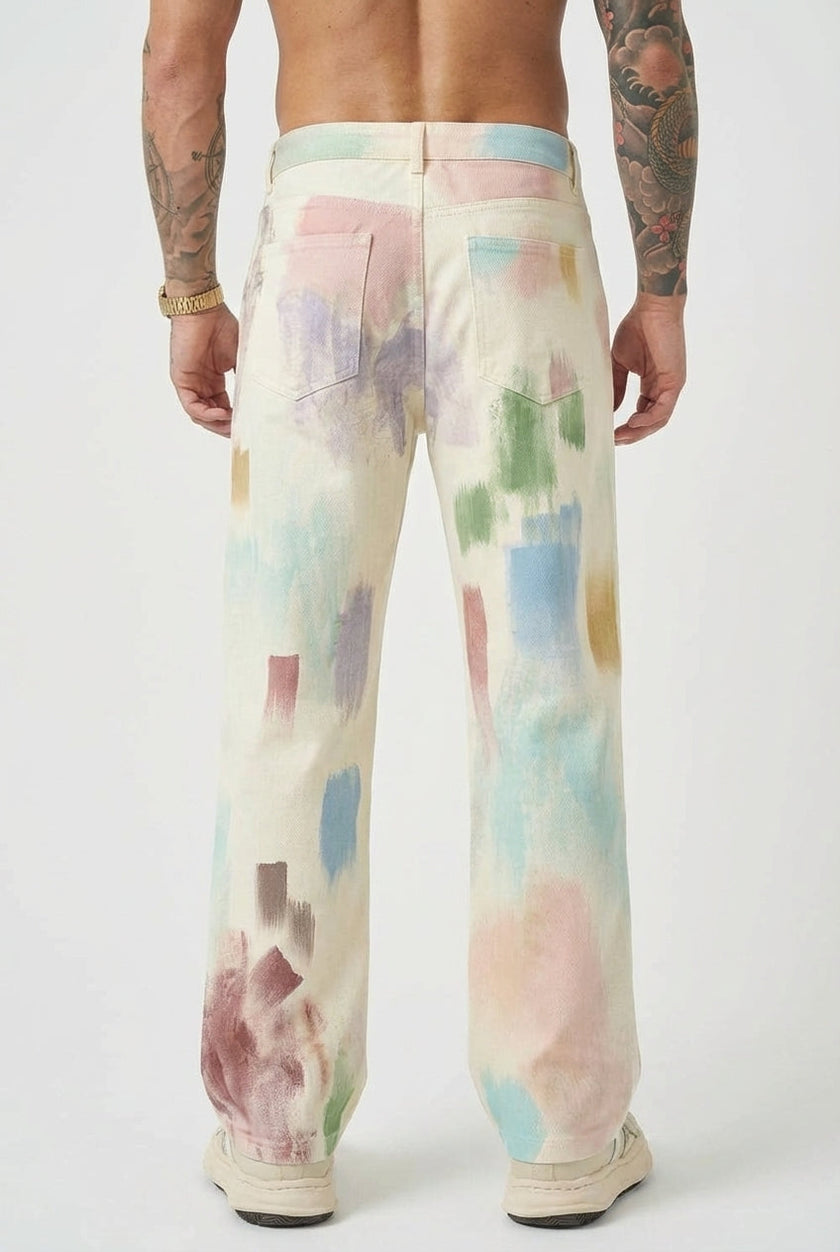 FJØRNA black painted men's trousers displayed on a model, showing the stylish design and fit of these modern pants.