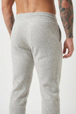FJØRNA men's merino wool trousers in light grey, stylish and comfortable pants with a tailored fit.