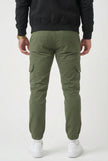 Men's cargo jogger trousers in army green by FJØRNA, featuring a relaxed fit, multiple pockets, and comfortable casual design.