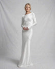 FJØRNA ivory satin slim fit maxi dress for women featuring long sleeves, elegant evening occasion style and luxurious fabric.