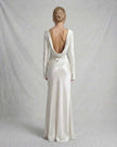 FJØRNA ivory satin slim fit maxi dress with low draped back, perfect for evening occasions and elegant events.