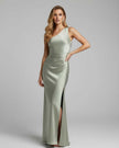 FJØRNA satin black tailored maxi dress with one-shoulder design, perfect for elegant occasions, shown in sage green.