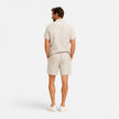 Men's lightweight summer set by FJØRNA, featuring breathable shirt and shorts for warm weather wear.