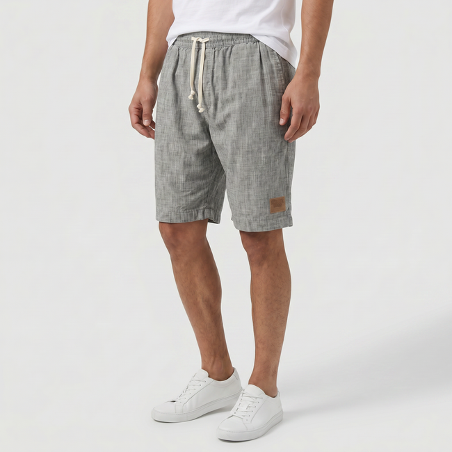Men's linen shorts with elasticated waist and drawstring, FJØRNA summer beach shorts for casual wear.