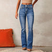 FJØRNA women's high-waist denim bootcut jeans for summer, showcasing light wash, slim fit, and classic bootcut style on a model.