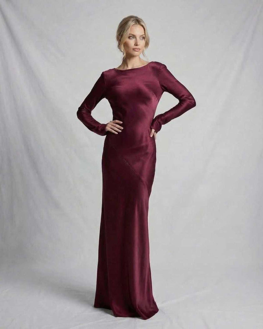 FJØRNA satin slim fit maxi dress in rich burgundy, featuring elegant, modern design and sophisticated silhouette.