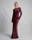 FJØRNA satin slim fit maxi dress in rich burgundy with elegant tie detail, luxurious fabric, and sleek silhouette.