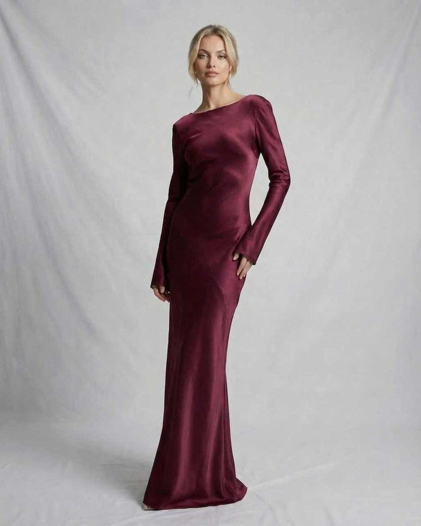 FJØRNA satin slim fit maxi dress in rich burgundy with elegant tie detail, luxurious fabric, and sleek silhouette.