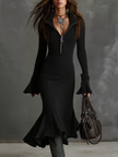 FJØRNA women's knit midi dress featuring a fitted silhouette and long sleeves, styled for casual or semi-formal occasions.