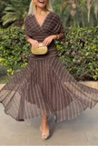 FJØRNA bohemian patterned V-neck mesh maxi dress featuring a casual wedding dress style with flowing fabric and intricate design.