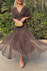 FJØRNA bohemian patterned V-neck mesh maxi dress featuring a casual wedding dress style with flowing fabric and intricate design.