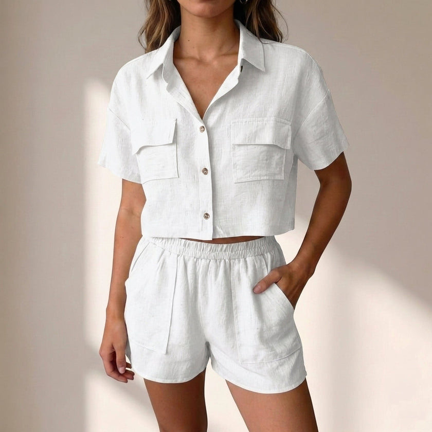 White women's two-piece summer co-ord set with relaxed fit and pockets by FJØRNA, perfect for casual warm-weather wear.