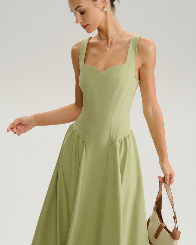 Women wearing a sage green FJØRNA sweetheart neck midi dress made of woven polyester, suitable for weddings and special occasions.